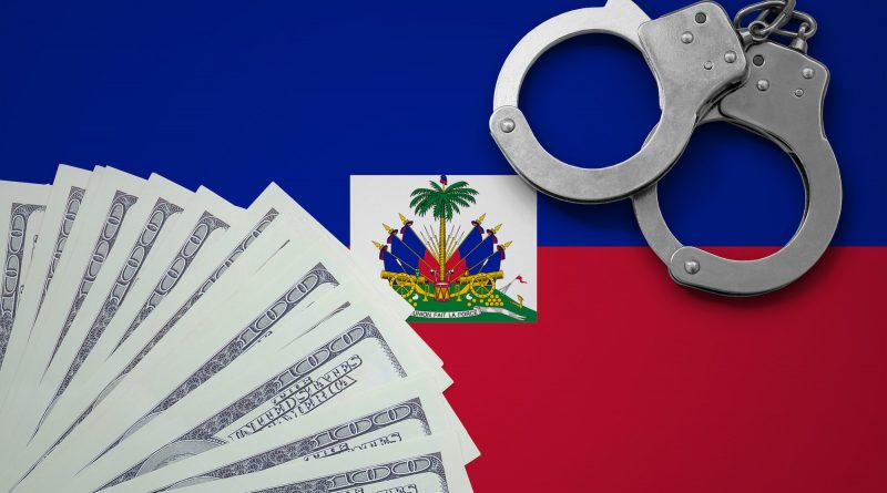 Haiti flag with handcuffs and a bundle of dollars