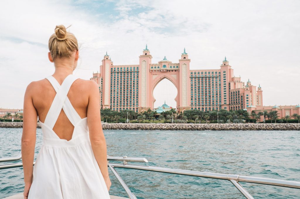 Woman overlooking Atlantis hotel from the boat
