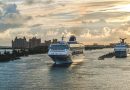A cruise ship makes its way through the channel coming out of port in Nassau, Bahamas