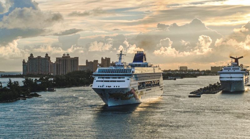 A cruise ship makes its way through the channel coming out of port in Nassau, Bahamas