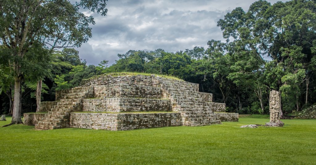 Pyramid and Stella in Great Plaza of Mayan Ruins - Copan Archaeological Site, Honduras
