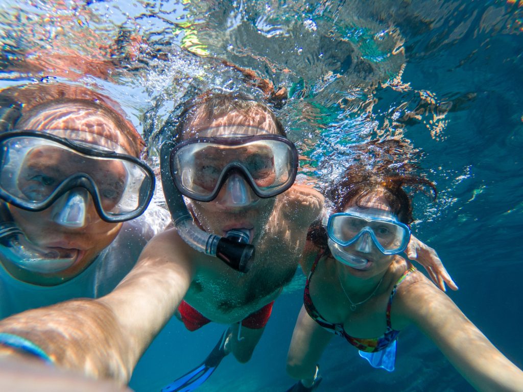 Underwater view of snorkeling friends