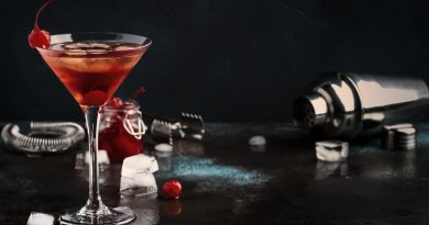 Manhattan alcoholic cocktail with bourbon, red vemuth, bitter, ice and cocktail cherry