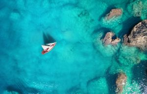 Yacht in the bay. View from the air. Travel image