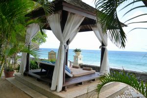 A private cabana for overlooking the Caribbean ocean sea. Luxury resort lifestyle.