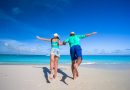 Young romantic couple have fun at Caribbean tropical beach