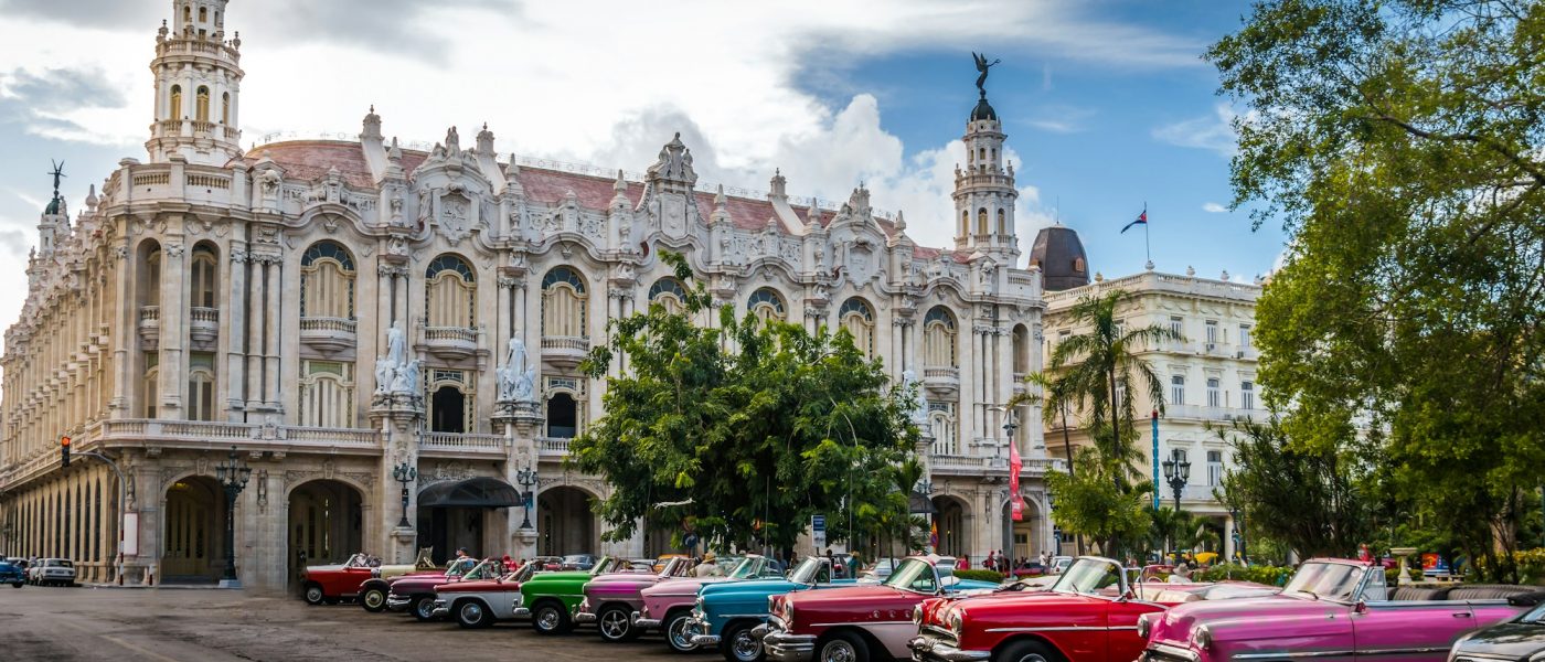 Cuban colorful vintage cars in front of the Gran Teatro - Havana, Cuba