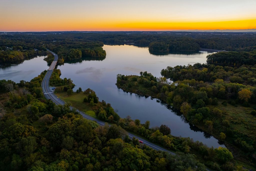 Aerial view of a highway road next to Seneca Lake at sunrise, Gaithersburg, Maryland, United States