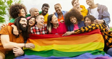 Happy diverse young friends celebrating gay pride day - LGBTQ community concept