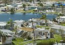 Hurricane Ian destroyed homes in Florida residential area. Natural disaster and its consequences