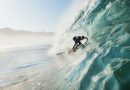Mid adult man surfing rolling wave, Leucadia, California, USA